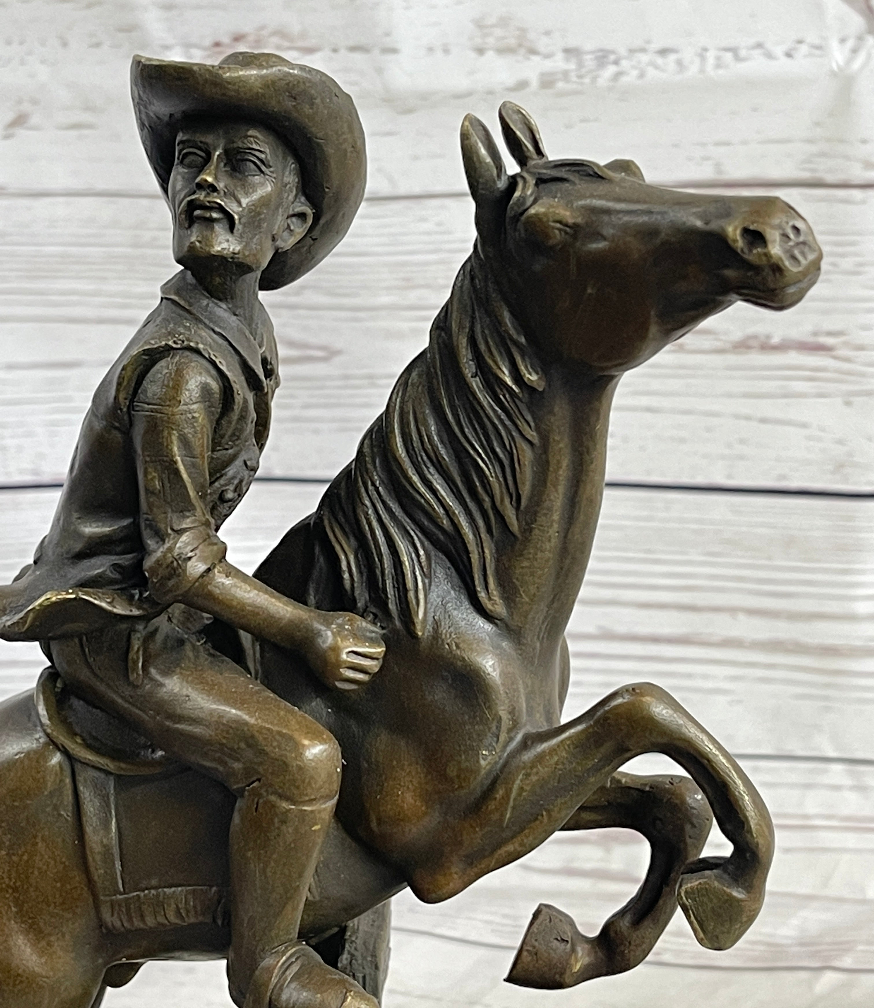 Cowboy on Horseback Hopping a Fence Bronze Sculpture