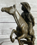 Cowboy on Horseback Hopping a Fence Bronze Sculpture
