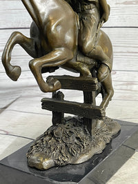 Cowboy on Horseback Hopping a Fence Bronze Sculpture