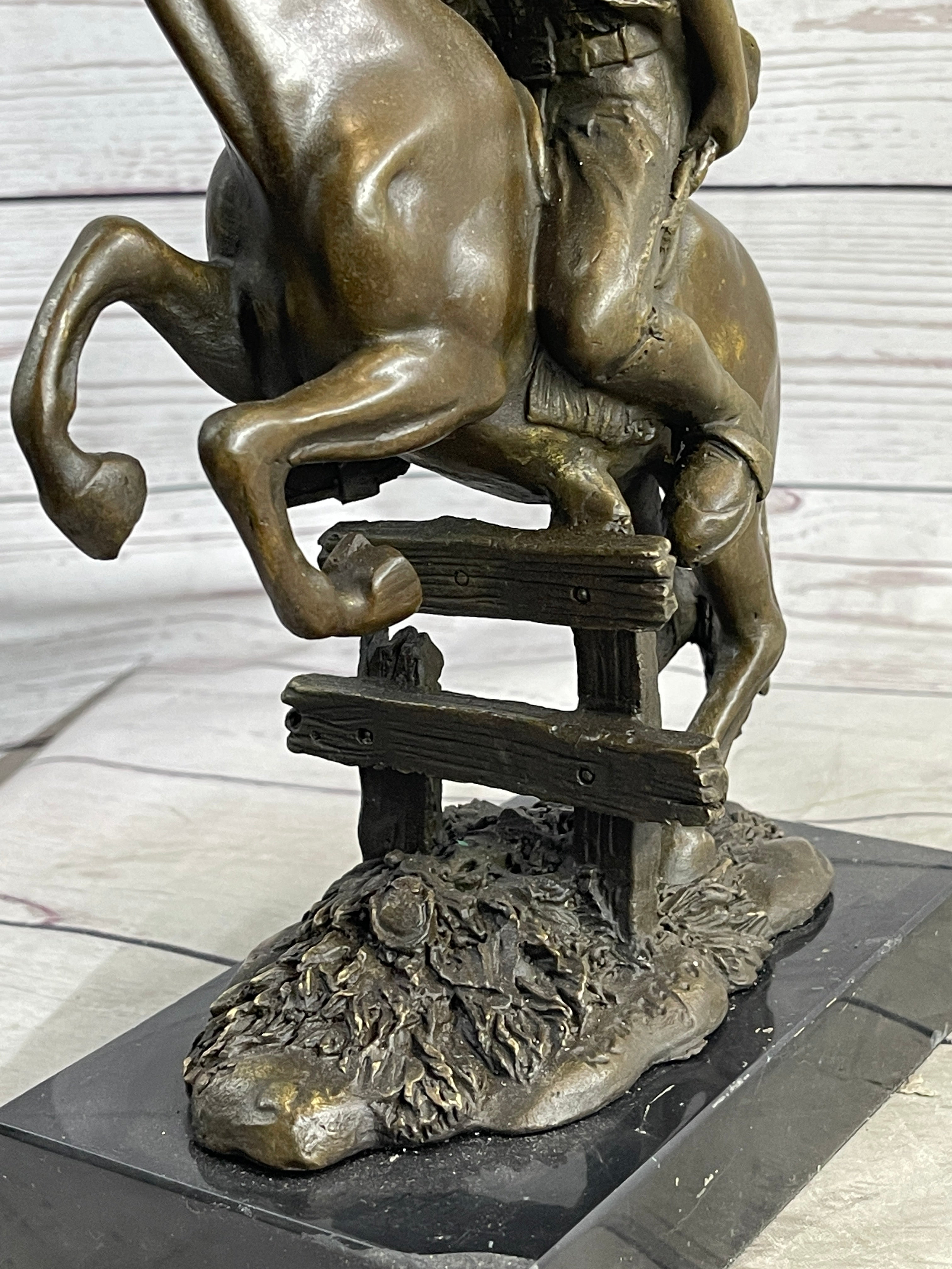 Cowboy on Horseback Hopping a Fence Bronze Sculpture