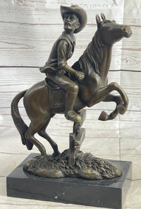 Cowboy on Horseback Hopping a Fence Bronze Sculpture