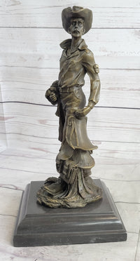 Cowboy Holding Horse Saddle Bronze Sculpture 13" x 6"