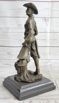 Cowboy Holding Horse Saddle Bronze Sculpture 13" x 6"