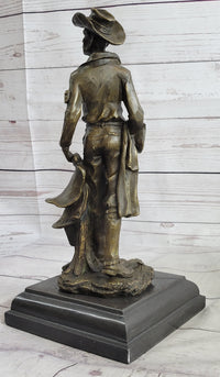Cowboy Holding Horse Saddle Bronze Sculpture 13" x 6"