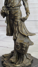 Cowboy Holding Horse Saddle Bronze Sculpture 13" x 6"