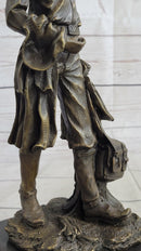 Cowboy Holding Horse Saddle Bronze Sculpture 13" x 6"