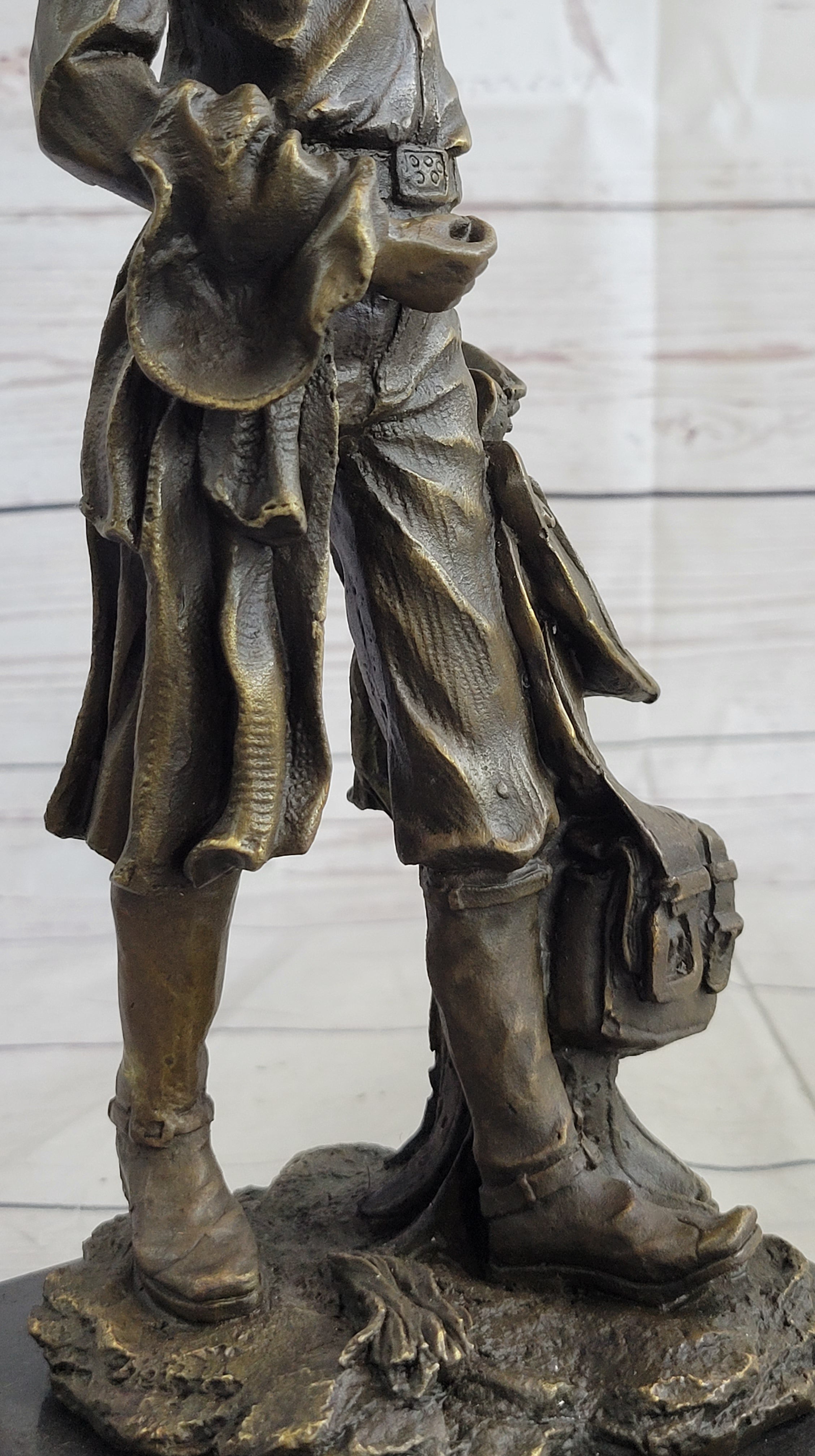 Cowboy Holding Horse Saddle Bronze Sculpture 13" x 6"