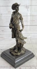 Cowboy Holding Horse Saddle Bronze Sculpture 13" x 6"
