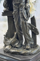 Cowboy Saddling Horse Bronze Sculpture 16" x 8"