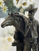 Cowboy Saddling Horse Bronze Sculpture 16" x 8"