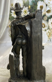 Cowboy Saddling Horse Bronze Sculpture 16" x 8"