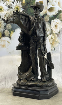 Cowboy Saddling Horse Bronze Sculpture 16" x 8"