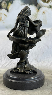 Girl Resting on Flower Bronze Sculpture 9" x 5"