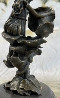 Girl Resting on Flower Bronze Sculpture 9" x 5"