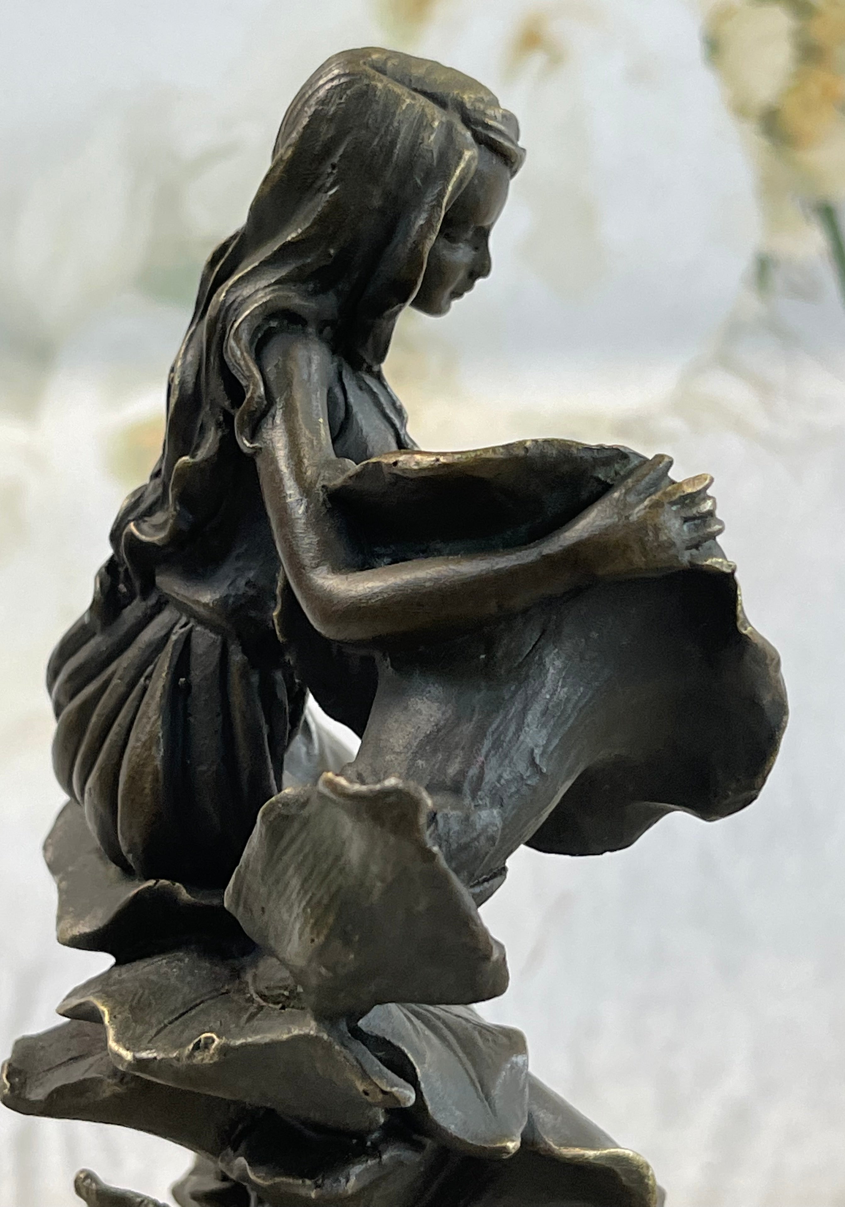 Girl Resting on Flower Bronze Sculpture 9" x 5"