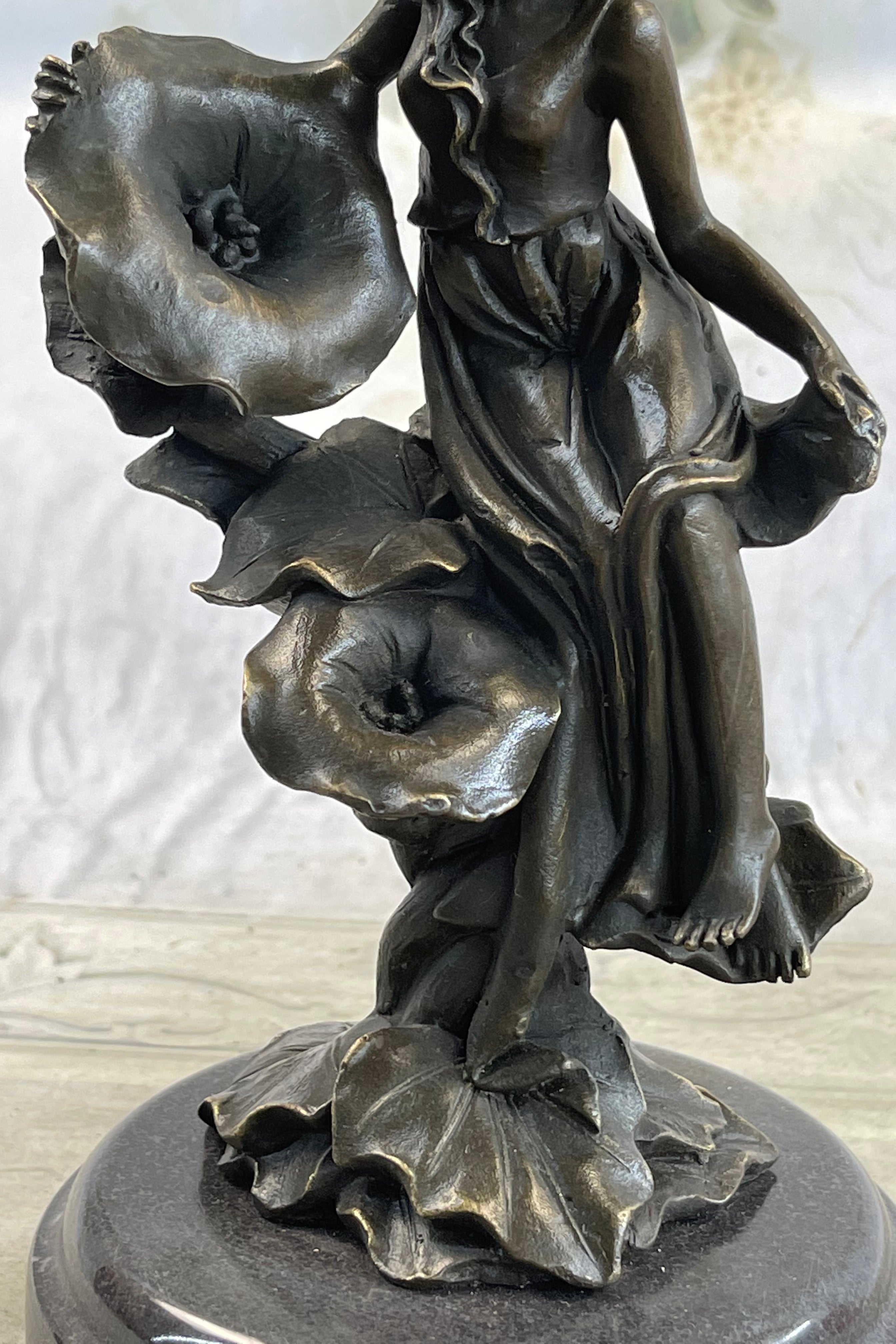 Girl Resting on Flower Bronze Sculpture 9" x 5"