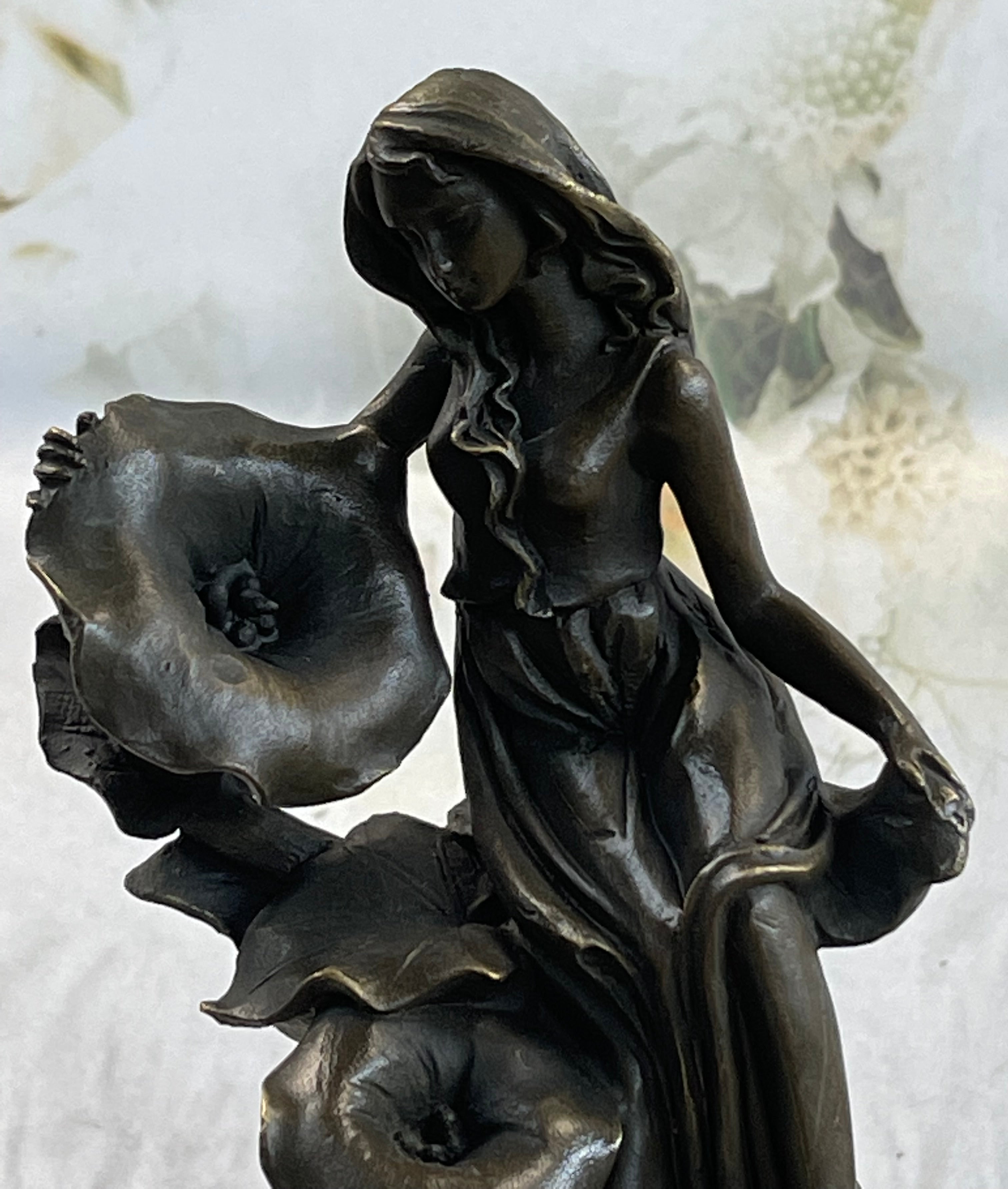 Girl Resting on Flower Bronze Sculpture 9" x 5"