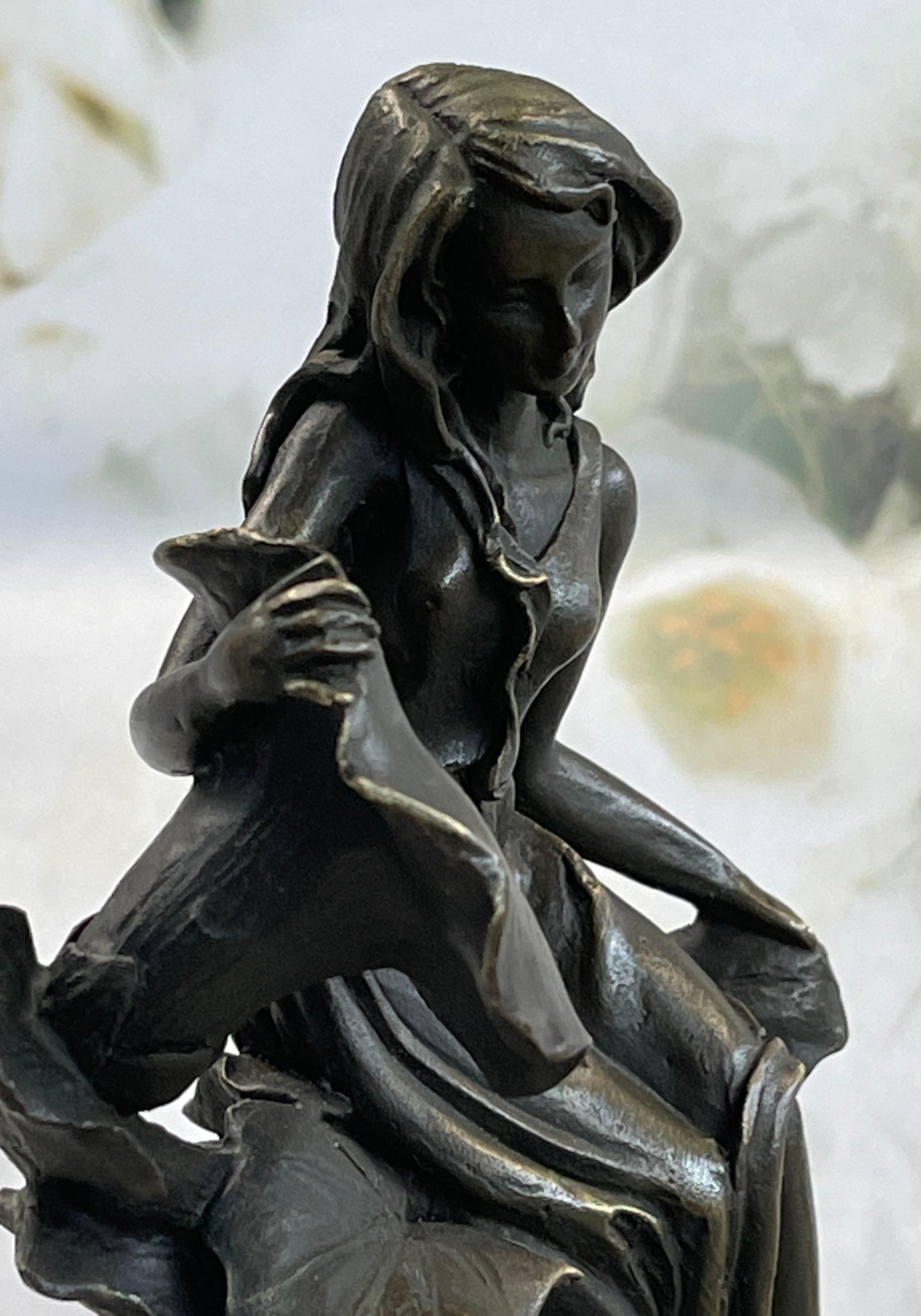 Girl Resting on Flower Bronze Sculpture 9" x 5"