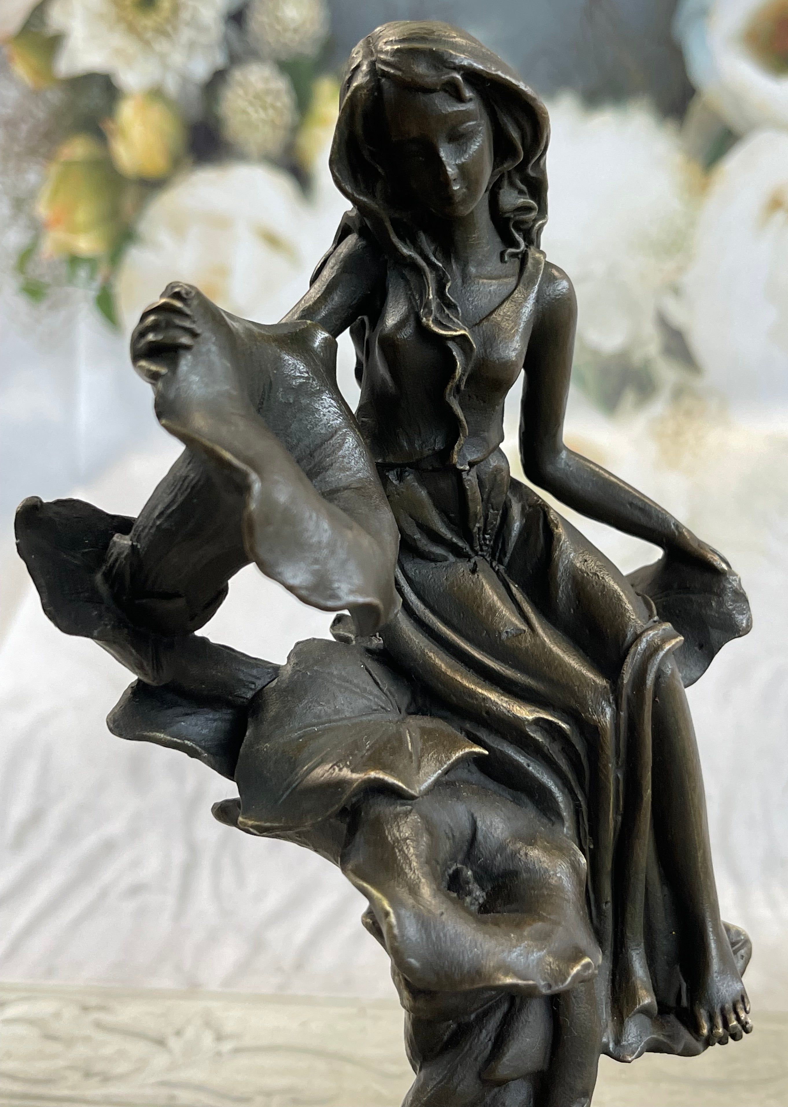 Girl Resting on Flower Bronze Sculpture 9" x 5"