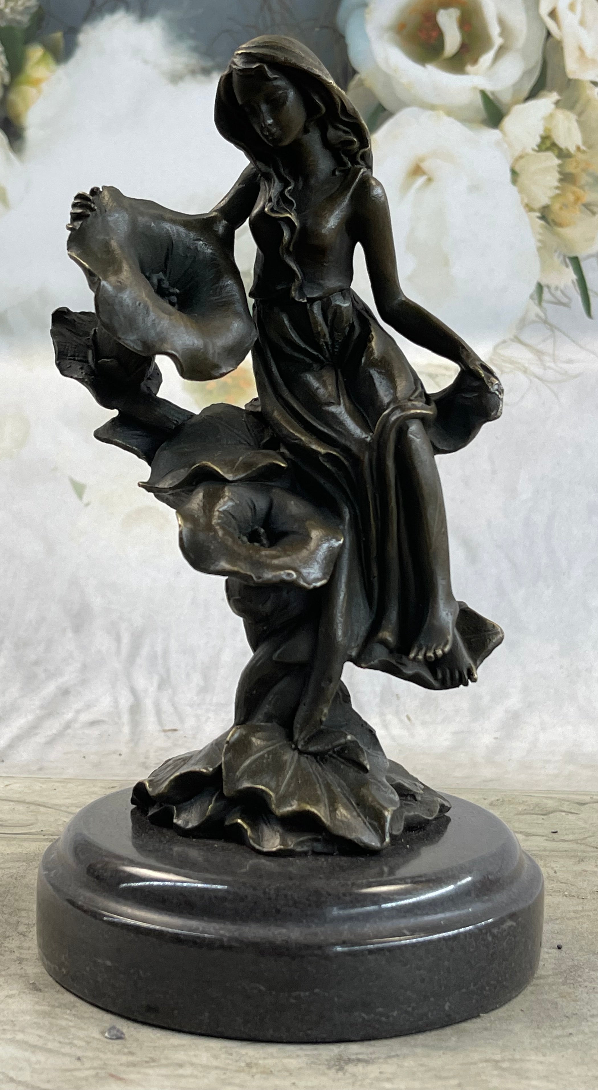 Girl Resting on Flower Bronze Sculpture 9" x 5"