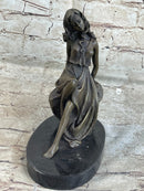 Young Girl Laying Against Rock Bronze Figure 8" x 6"