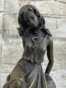 Young Girl Laying Against Rock Bronze Figure 8" x 6"