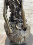 Young Girl Laying Against Rock Bronze Figure 8" x 6"