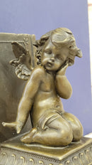 Puti Baby Angel Bookends by Augustine Moreau
