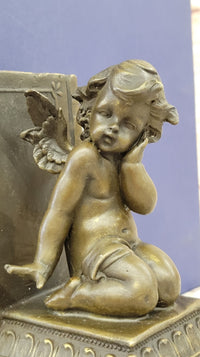 Puti Baby Angel Bookends by Augustine Moreau