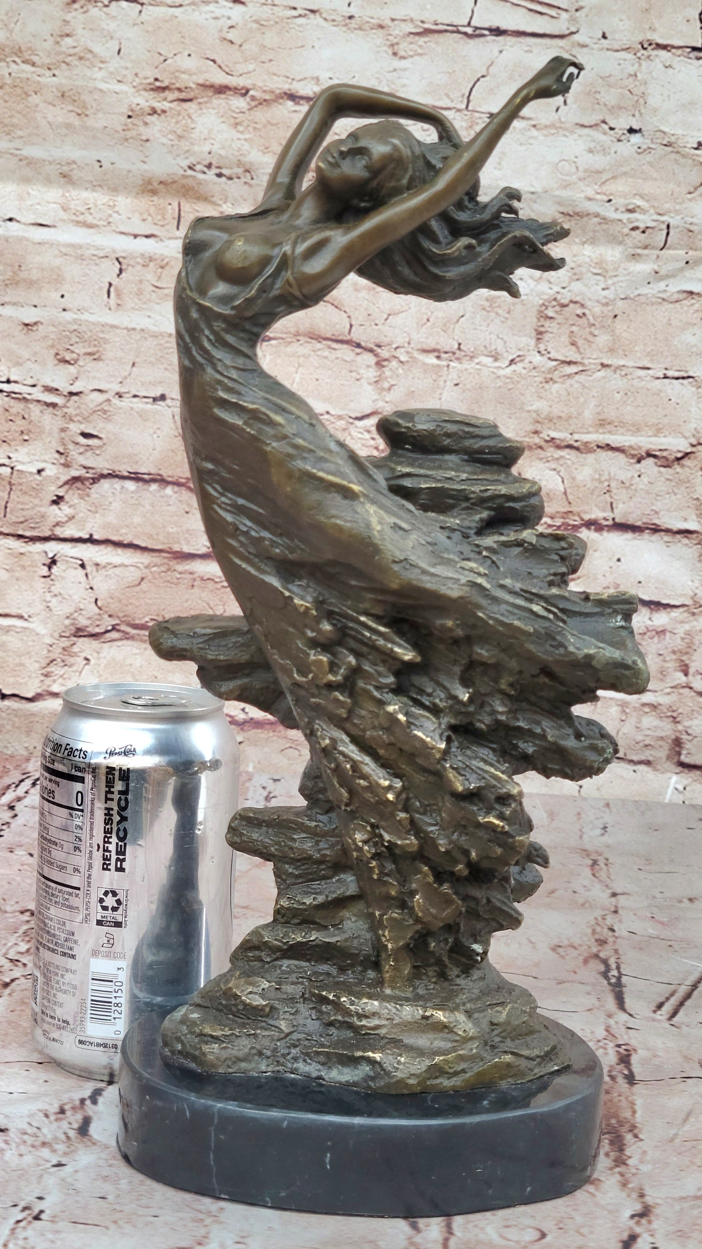 Bronze Sculpture of Woman Embracing Wind – Flowing Gown