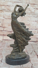 Bronze Sculpture of Woman Embracing Wind – Flowing Gown