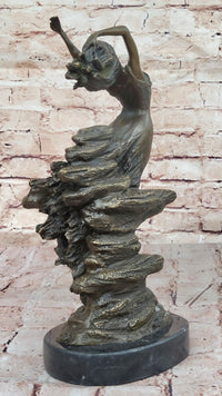 Bronze Sculpture of Woman Embracing Wind – Flowing Gown