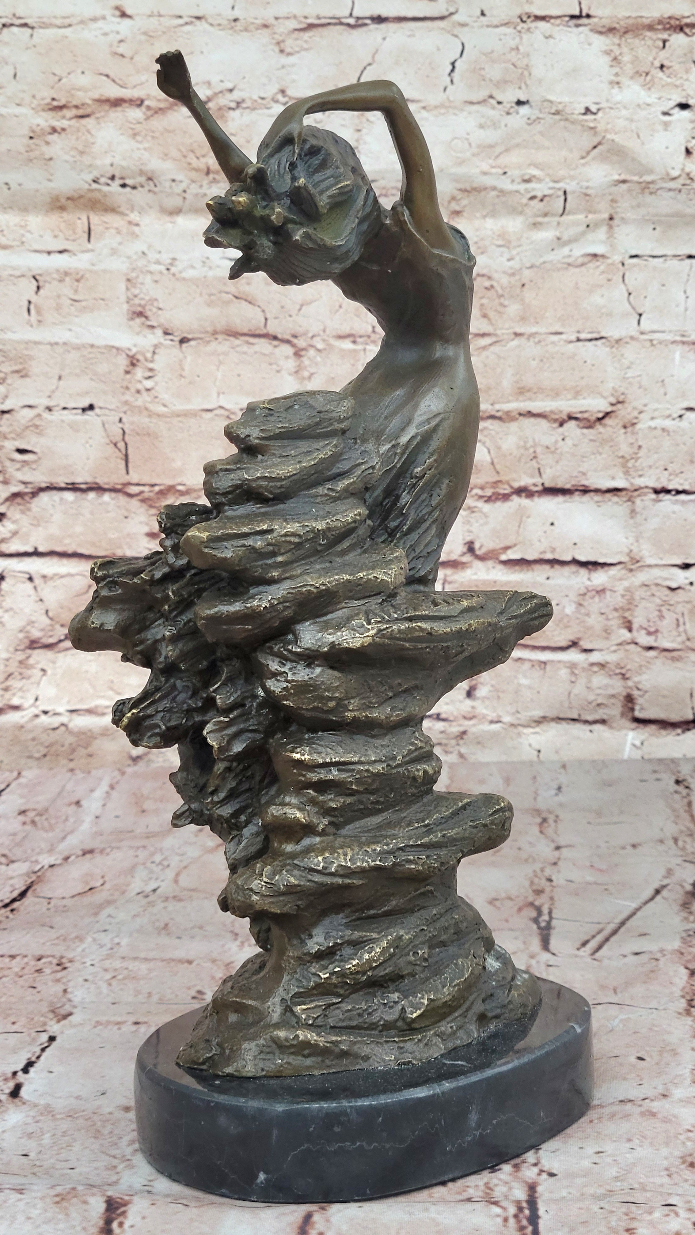 Bronze Sculpture of Woman Embracing Wind – Flowing Gown