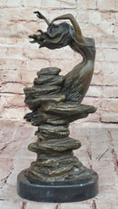 Bronze Sculpture of Woman Embracing Wind – Flowing Gown