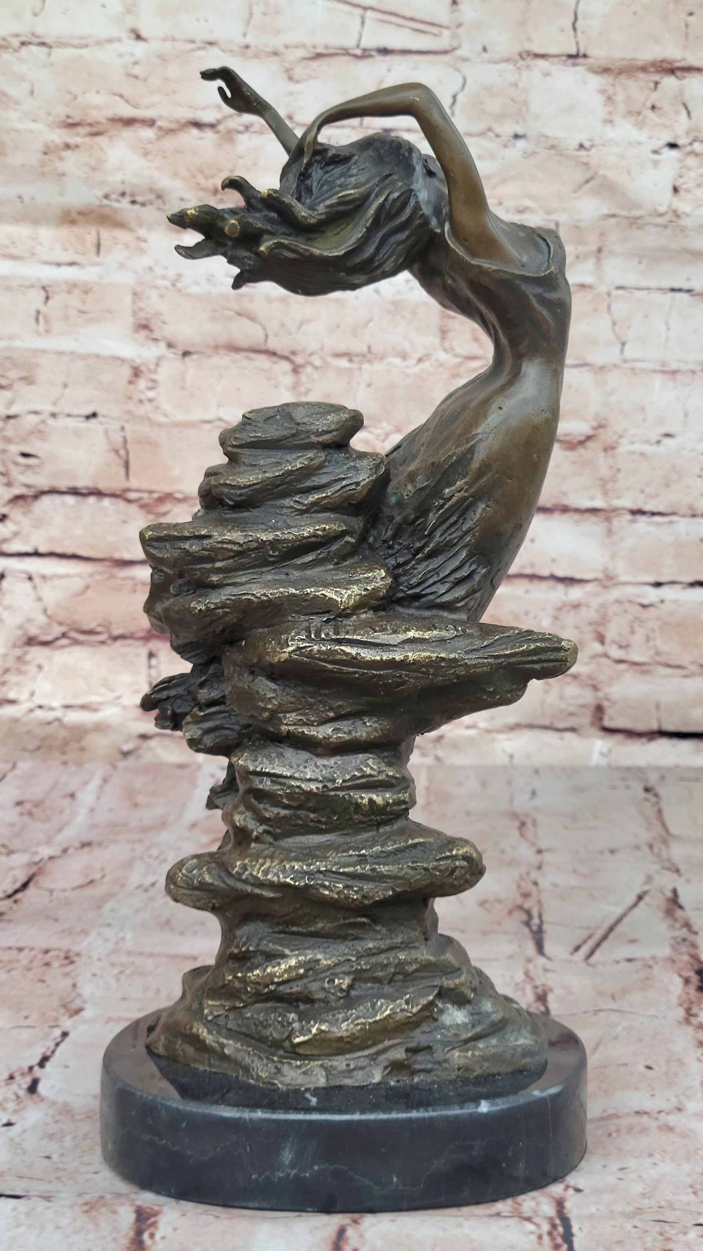 Bronze Sculpture of Woman Embracing Wind – Flowing Gown