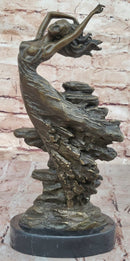 Bronze Sculpture of Woman Embracing Wind – Flowing Gown
