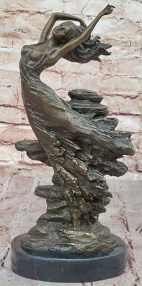 Bronze Sculpture of Woman Embracing Wind – Flowing Gown