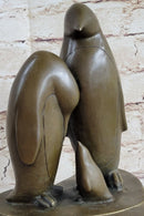 Penguin Family on Heart Shaped Marble Base Bronze 8" x 6"