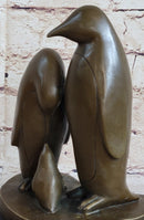 Penguin Family on Heart Shaped Marble Base Bronze 8" x 6"