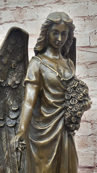 Bronze Angel with Roses – Winged Sculpture