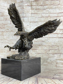 Eagle Landing with Outstretched Talons Bronze Sculpture