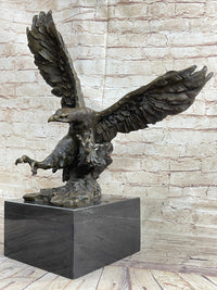Eagle Landing with Outstretched Talons Bronze Sculpture