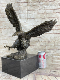 Eagle Landing with Outstretched Talons Bronze Sculpture