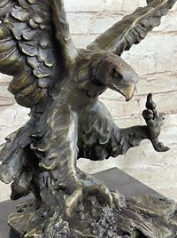 Eagle Landing with Outstretched Talons Bronze Sculpture