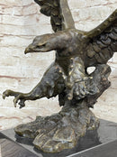 Eagle Landing with Outstretched Talons Bronze Sculpture