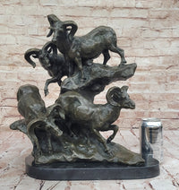 Bronze Sculpture of Rams on Rocky Outcrop – Wildlife Scene