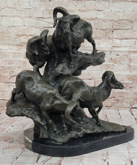 Bronze Sculpture of Rams on Rocky Outcrop – Wildlife Scene