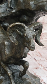 Bronze Sculpture of Rams on Rocky Outcrop – Wildlife Scene
