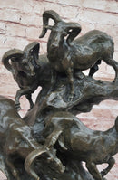 Bronze Sculpture of Rams on Rocky Outcrop – Wildlife Scene
