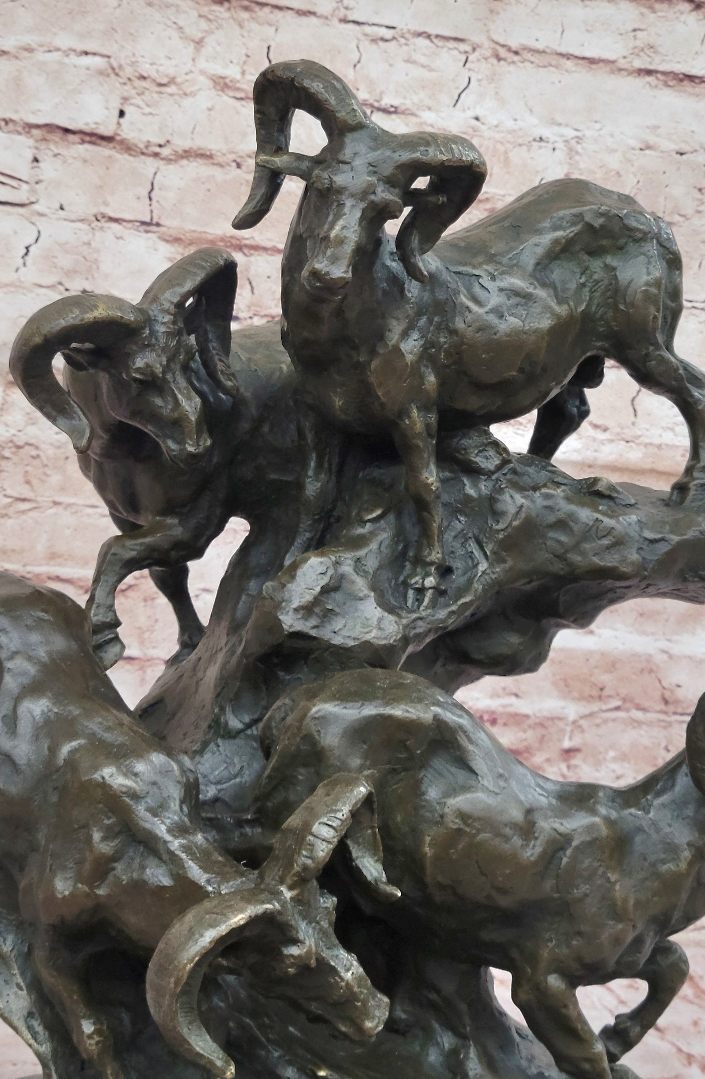 Bronze Sculpture of Rams on Rocky Outcrop – Wildlife Scene